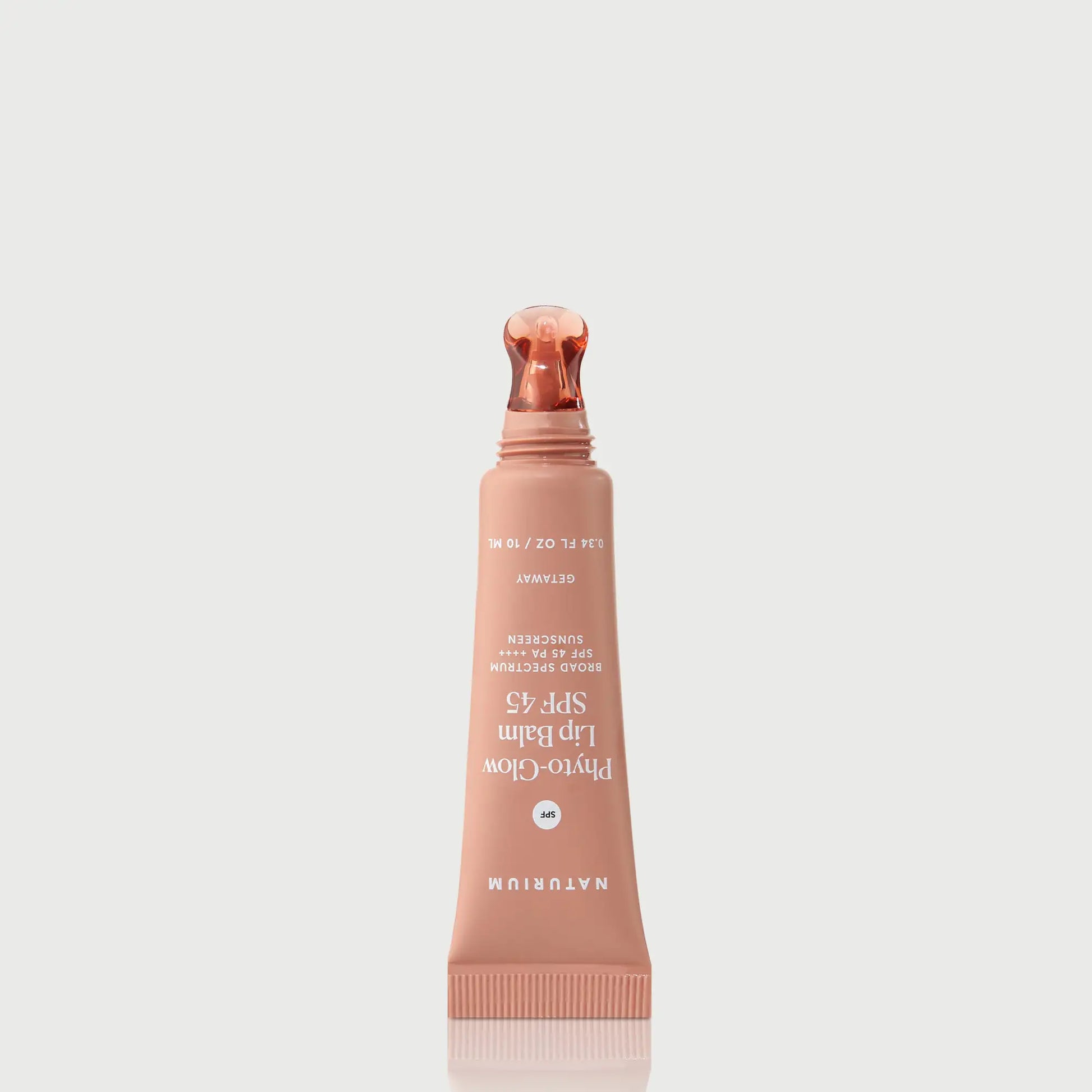 phyto-glow-lip-balm-spf-45-getaway-i7 NATR-10126_PhytoGlow_SPF_Getaway_primary_nocap_bonebkgd_1.webp