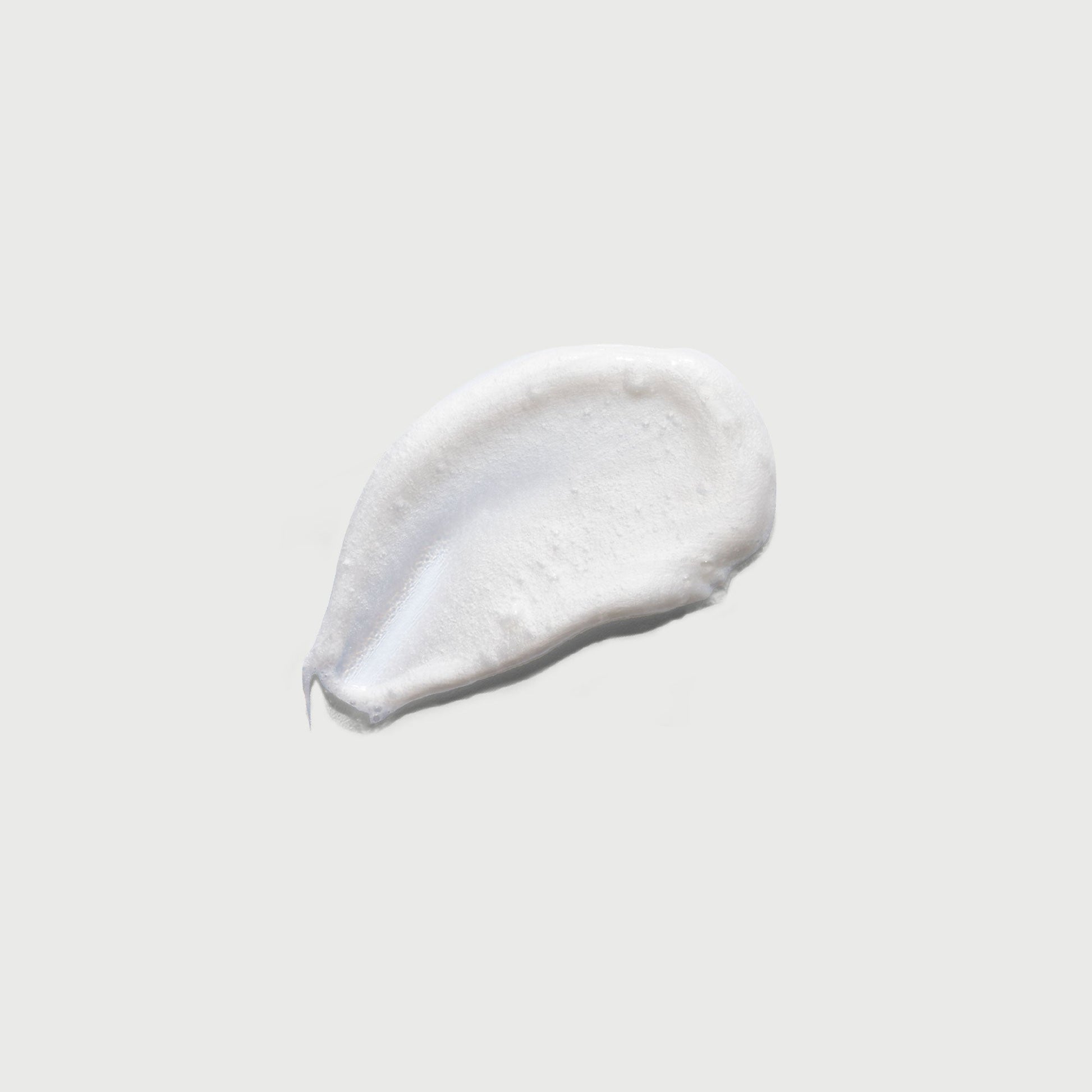 the-smoother-glycolic-acid-exfoliating-body-wash-d0 NATR-40002-Swatch-The-Smoother-Glycolic-Acid-Exfoliating-Body-Wash-bonebkgd.jpg