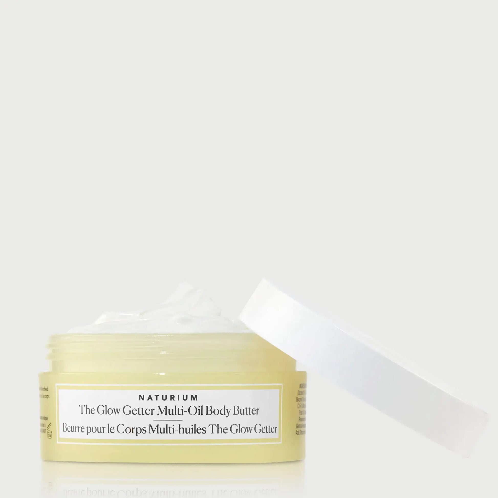 the-glow-getter-multi-oil-body-butter-travel-size-n1 NATR-40115_Glow-Getter-Body-Butter-Mini_front_capoff_bonebkgd.webp