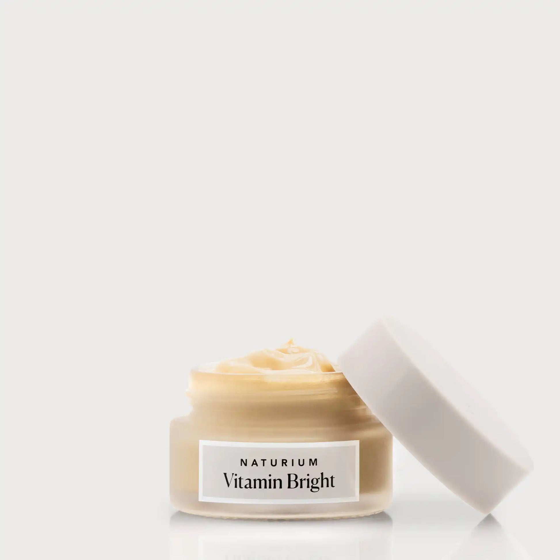 vitamin-bright-illuminating-eye-cream-u9 NATR-VitaminBright_LIGHT_Primary_front_openjar_bone.webp